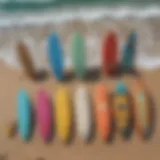 A vibrant collection of skimboards displayed on the beach, showcasing various designs and colors.