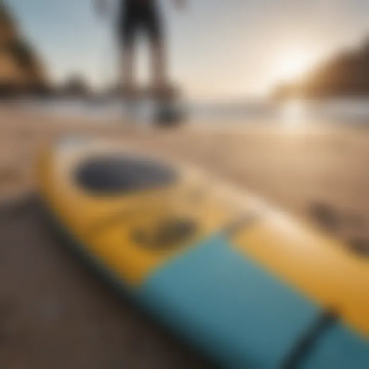 Essential paddle boarding gear displayed on a sandy beach