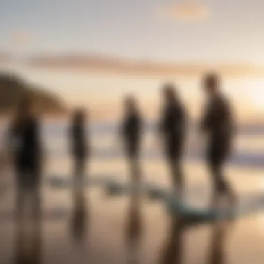 A group enjoying a surf lesson at sunset