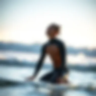 Surfer practicing deep breathing techniques on the beach