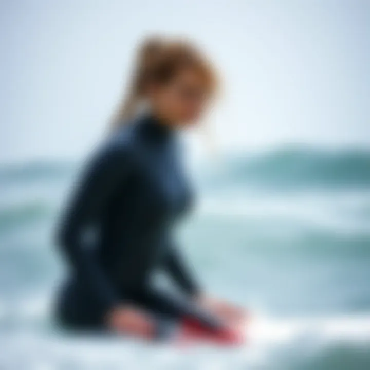 Woman showcasing wetsuit fit while surfing