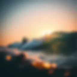 A surfer catching a wave during sunrise