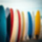 Exploring Surfboard Sizes A close-up view of various surfboard sizes lined up on the beach