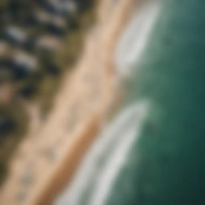 An aerial view of surfers enjoying electric surfboards at a popular beach