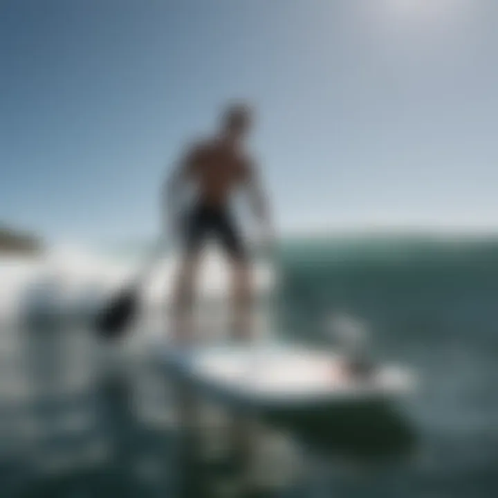 Surfer demonstrating paddle board techniques