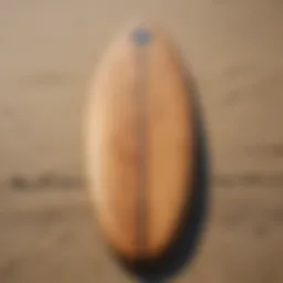 Artisan-crafted wooden surfboard with natural grain