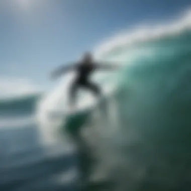 Surfer maneuvering skillfully with hydro tech fins on a wave