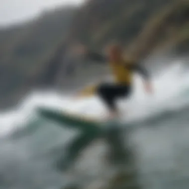 Surfer performing a maneuver with quad fins in action.