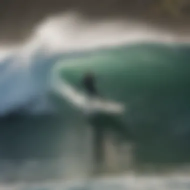 An experienced surfer riding a wave at Santa Cruz beach