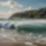 A panoramic view of San Juan's coastline with surfers riding waves