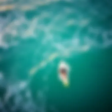 An aerial perspective of a vibrant surf spot bustling with activity