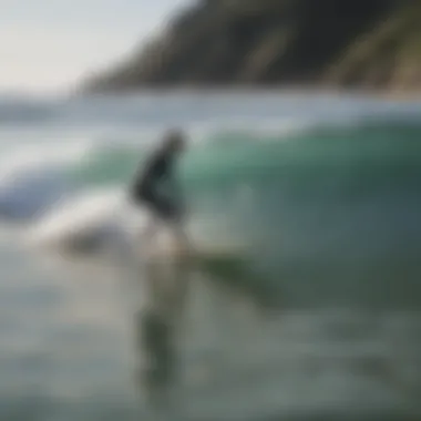 A beginner surfer taking lessons on calm waters