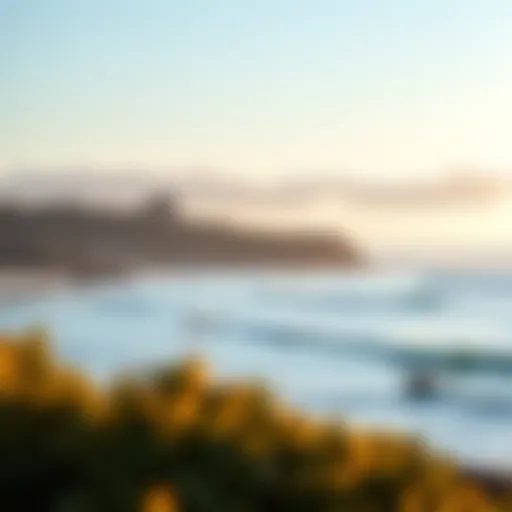 A stunning view of Capitola's shoreline with surfers catching waves.