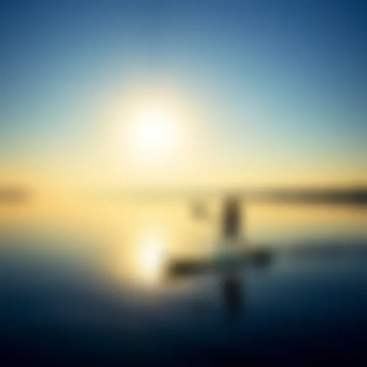 A serene paddle boarding scene on a calm lake at sunrise, showcasing the tranquility of the sport