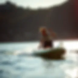 A sleek motorized stand-up paddleboard gliding across the water.