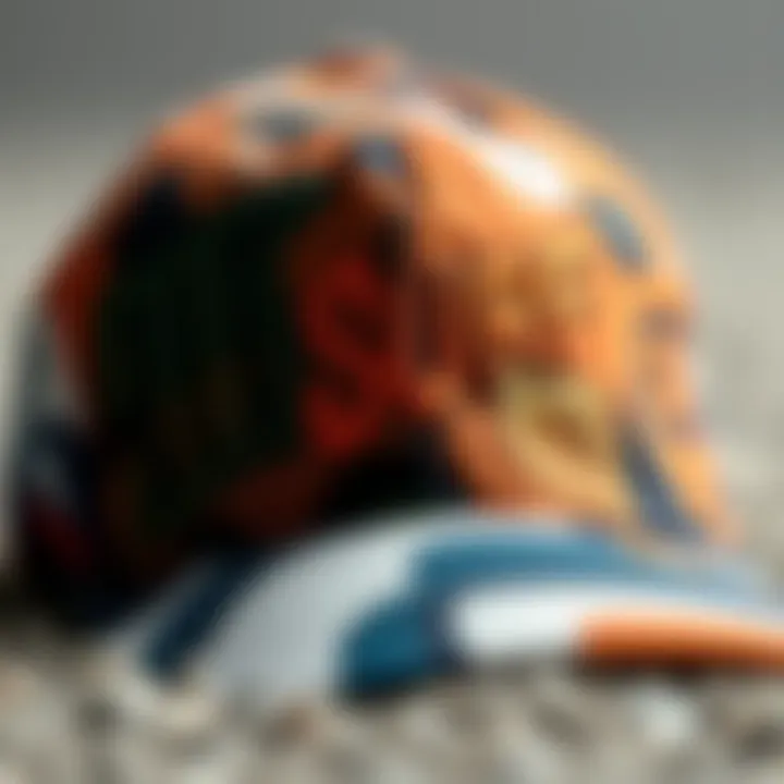 A close-up of a stylish baseball cap featuring surf-related graphics and patterns