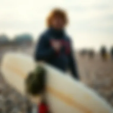 A local surfer showcasing their gear on Brighton's famous pebbled beach