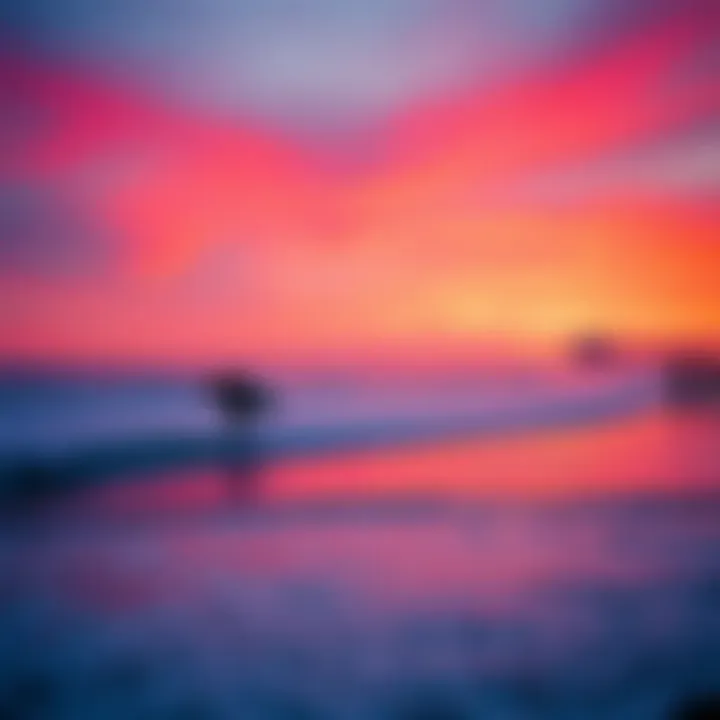 A stunning sunset over Brighton beach with surfers in the water