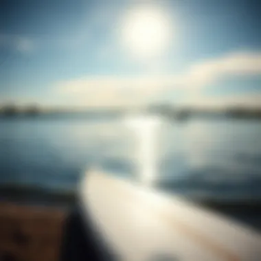 Surfboard on the Tranquil Shores of Austin Surfboard resting on the shore of a lake in Austin