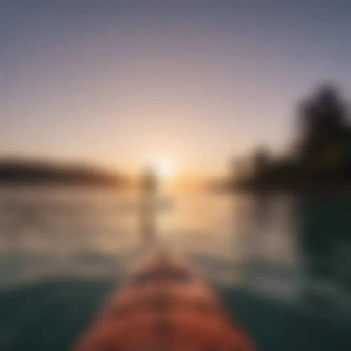 A serene landscape of a paddleboarder gliding over calm waters during sunset