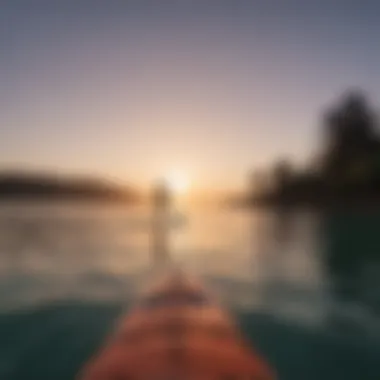 Paddleboarding at Dusk A serene landscape of a paddleboarder gliding over calm waters during sunset