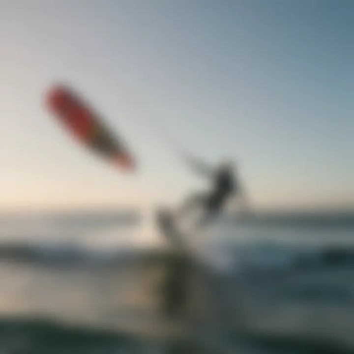 A kite surfer skillfully riding the waves along the LA coast