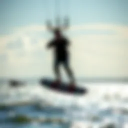 An exhilarating moment of kitefoiling with a rider gliding over water