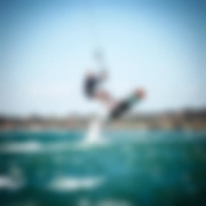 Dynamic action shot of a kitefoiler executing a jump