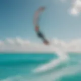 A breathtaking view of a kitesurfer gliding over turquoise waters of the Maldives