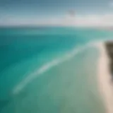 A breathtaking aerial view of kitesurfers gliding over the turquoise waters of Turks and Caicos.