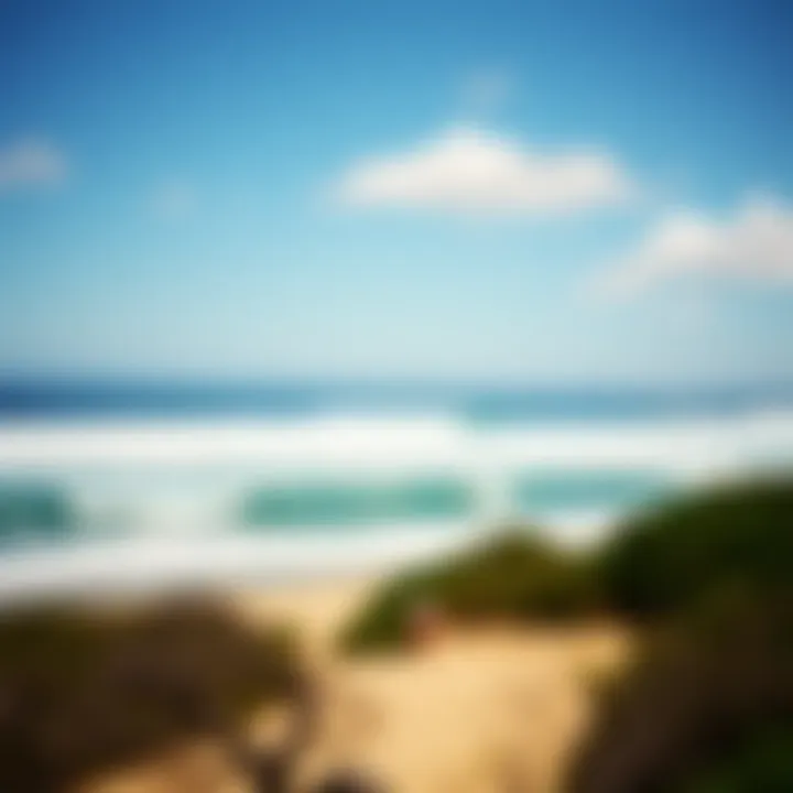 A breathtaking view of the ocean at La Pointe Surf Camp, highlighting the vibrant waves and sandy beach.