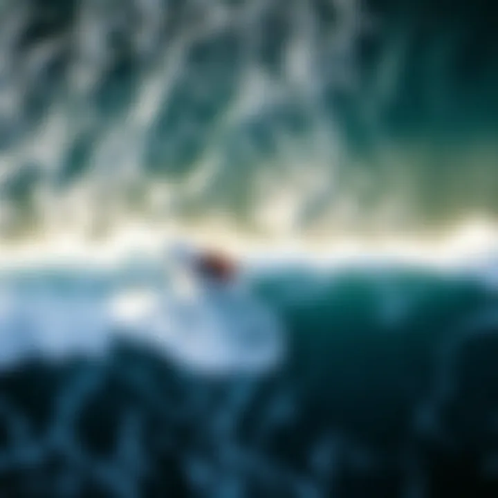 An aerial view of a bodyboarder skillfully maneuvering across the surf, illustrating advanced techniques.