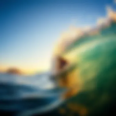 Surfer catching a perfect wave at sunrise