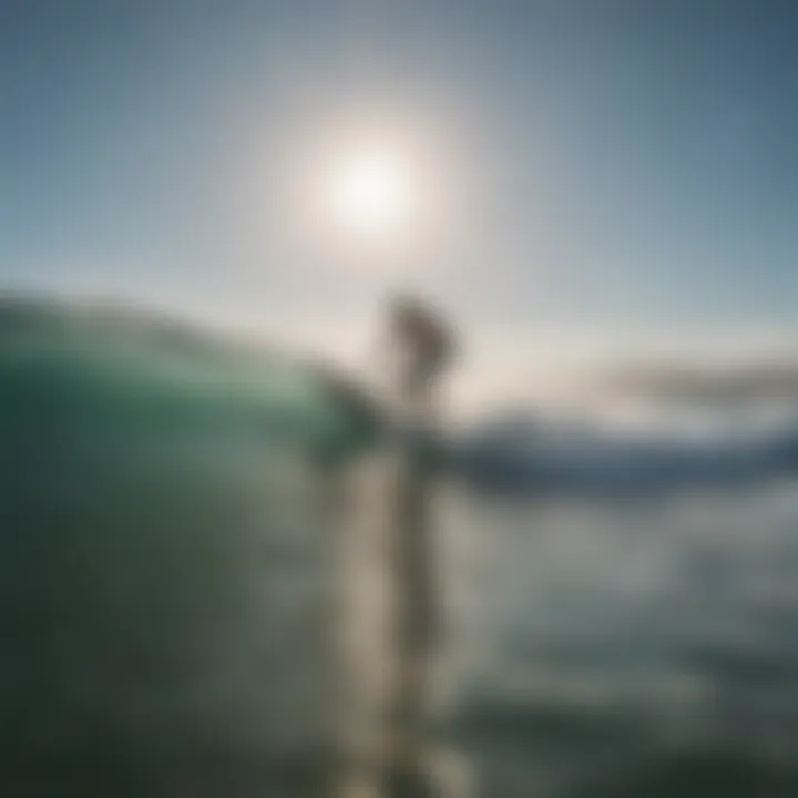 A paddle boarder experiencing ocean waves