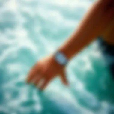 Surfer wearing a shark protection bracelet in the ocean