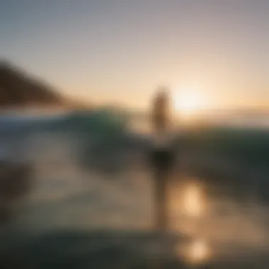 A surfer enjoying a peaceful moment on the water at sunset