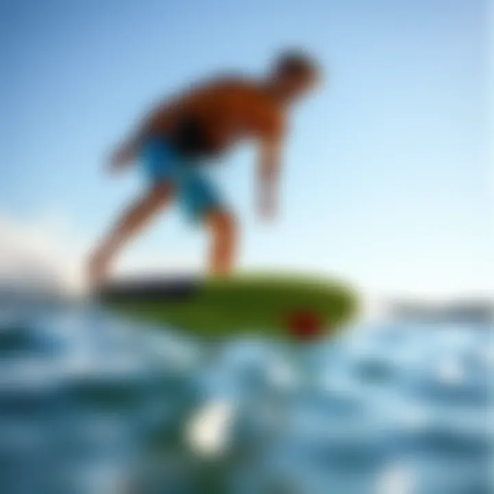 A surfer practicing techniques on a wake surf board behind a boat