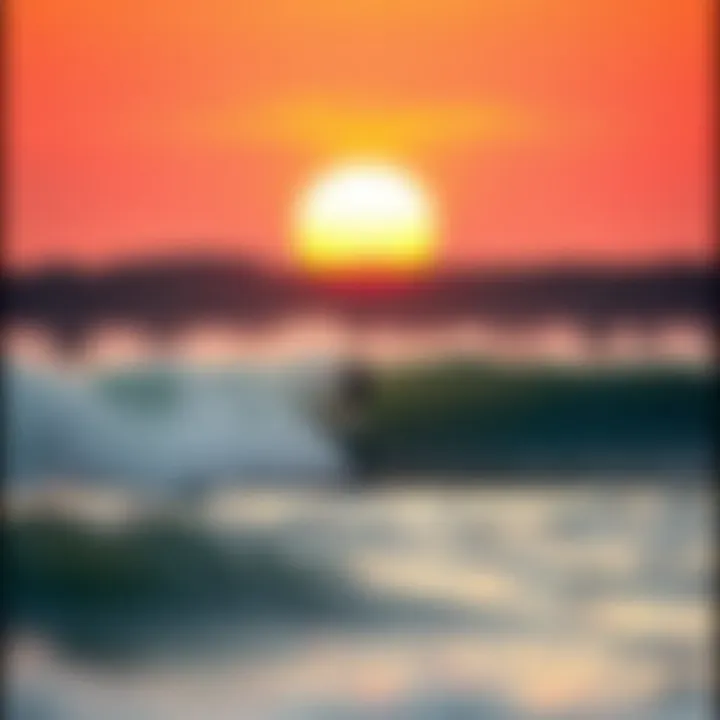 Surfers riding the waves at Ventura Point during a vibrant sunset