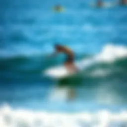 Skimboarder gliding across the water's surface
