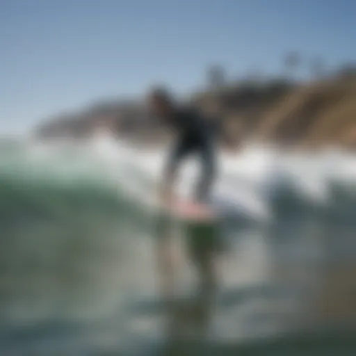 Beginner surfer riding a wave in San Diego