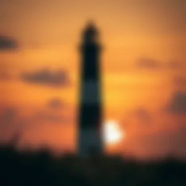 An elegant lighthouse standing tall against a dramatic sunset