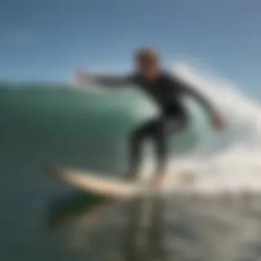 An action shot of a longboard surfer riding a wave, demonstrating agility and skill.