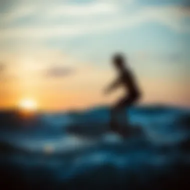 A surfer using a boogie board at sunset