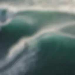 Aerial view of surfers riding waves influenced by wind gusts