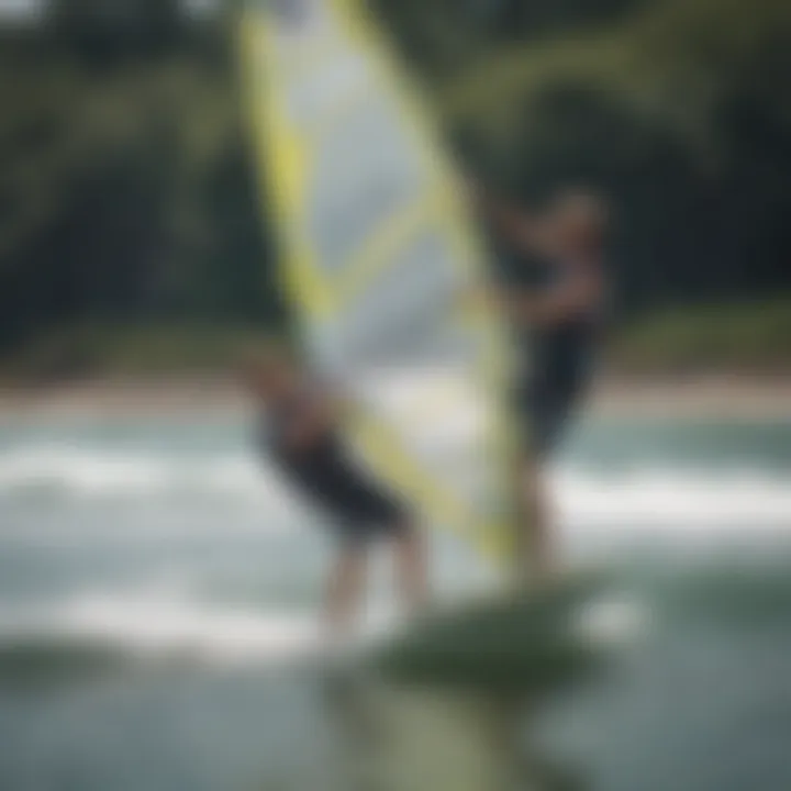 Instructor teaching windsurfing techniques to a novice